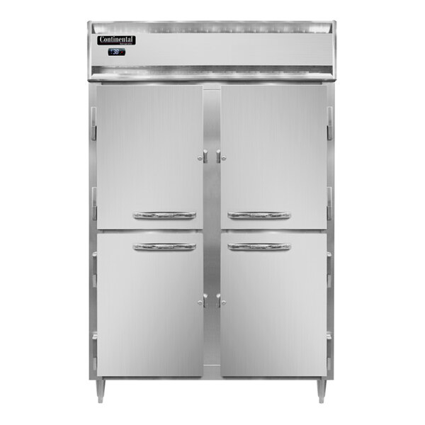 A large white Continental Refrigerator with two open half doors.