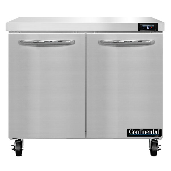 A Continental Refrigerator undercounter freezer with two doors.