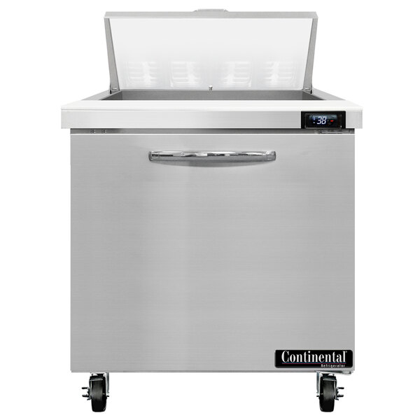A stainless steel Continental Refrigerator with a clear cover over a rectangular area inside.