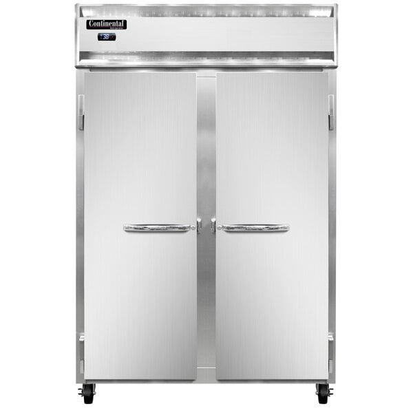A large white Continental Refrigerator with two doors open.