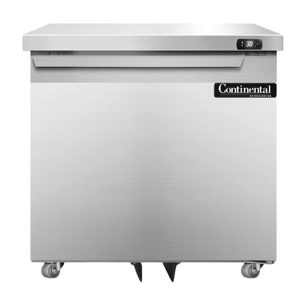 A Continental Refrigerator stainless steel undercounter refrigerator with the door open.