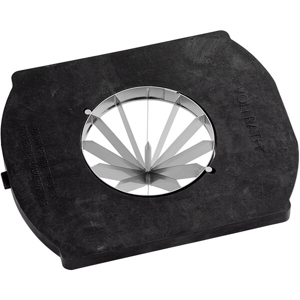 A black square with a circular cutout with many blades inside.