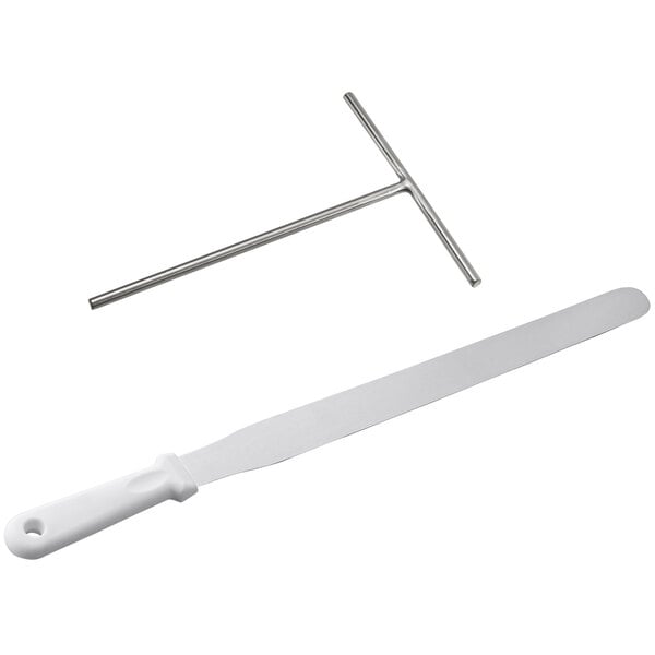 A white plastic Carnival King crepe spatula with a white handle and a metal tool.