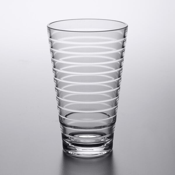 A clear GET Cirq plastic glass with a spiral pattern.