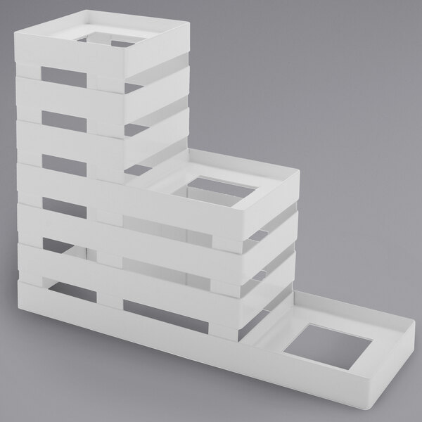 A white stack of display stands.