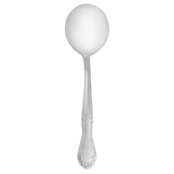 A Walco stainless steel bouillon spoon with a white handle.