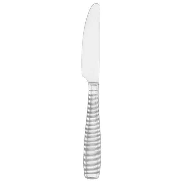 A silver knife with a white plastic handle.