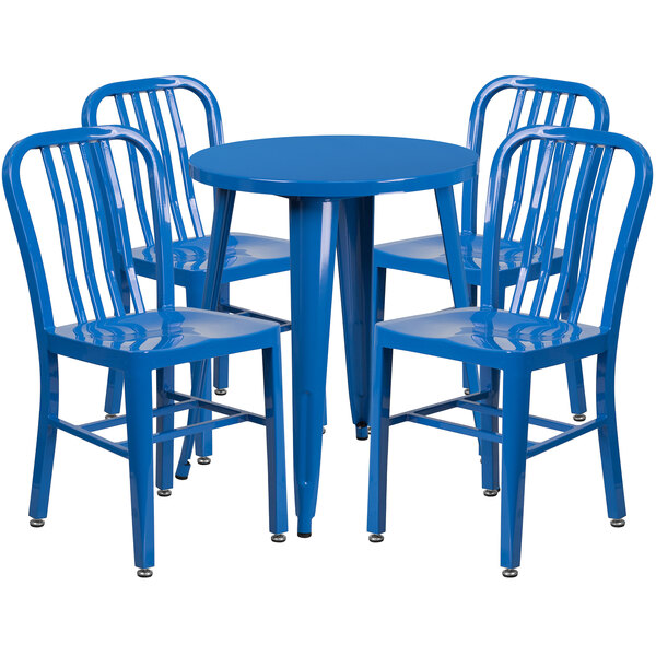 A blue metal table with four blue chairs with a round table.
