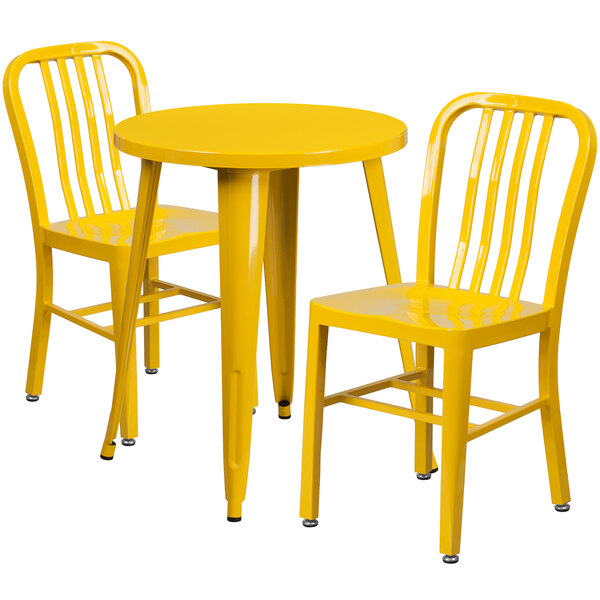 A Flash Furniture yellow metal table and two chairs.