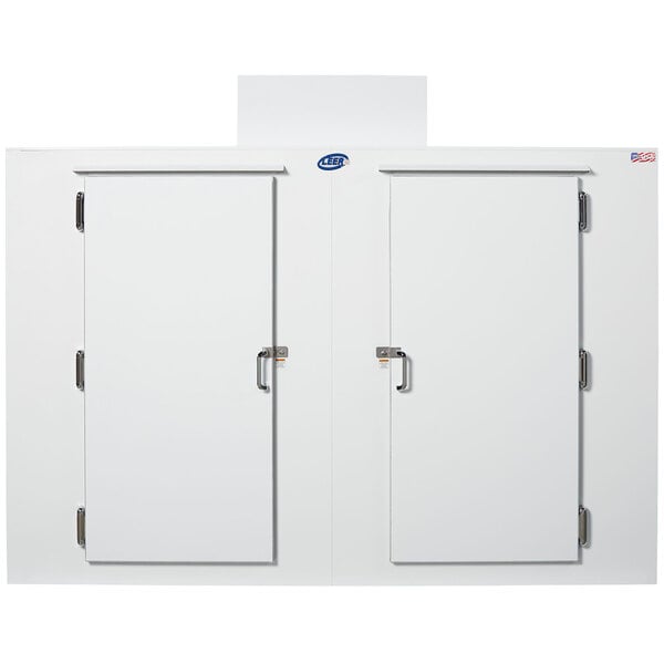 A white Leer reach-in freezer with steel doors and silver handles.