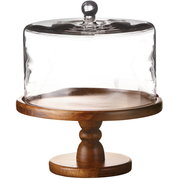 An American Atelier Madera wood cake stand with a glass cover.