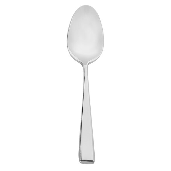 A white spoon with a silver handle.