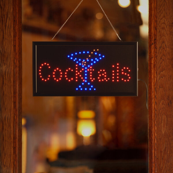 A rectangular LED sign that says "Cocktails" with a martini glass in the middle.