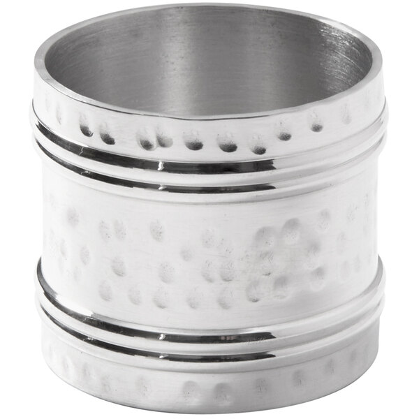 An American Metalcraft hammered aluminum napkin ring with a circular design.