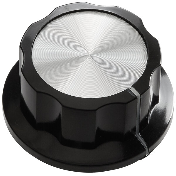 A black knob with a silver knob on top.