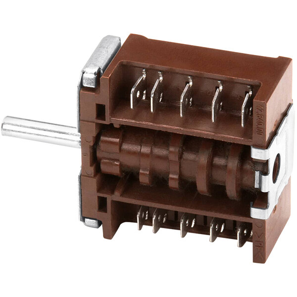 A brown rectangular switch with metal parts.