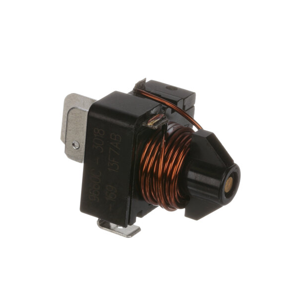 A small black electrical switch with a copper coil.