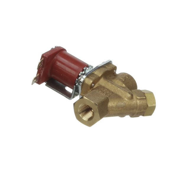 A close-up of a brass Eagle Group solenoid valve with a red handle.