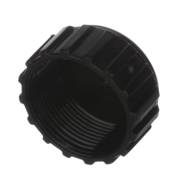 A black plastic cap with a hole.