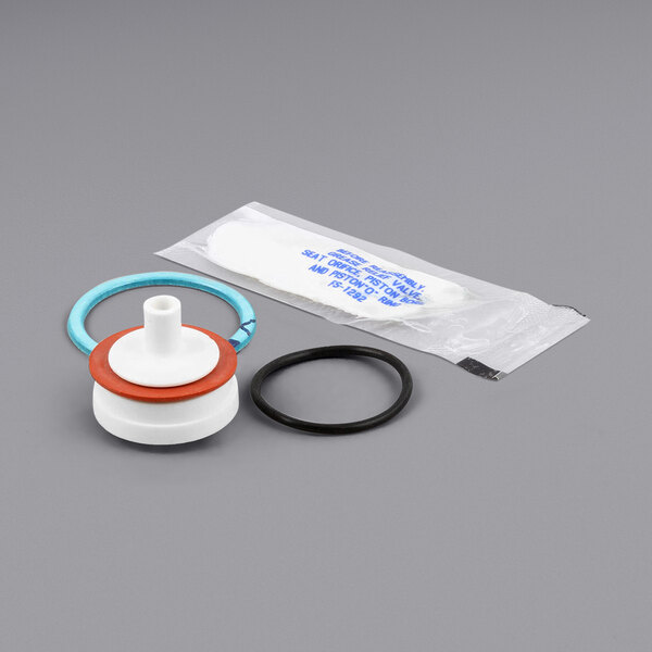 A CMA 1/2 Vac Breaker Repair Kit with a water filter and rubber seal.