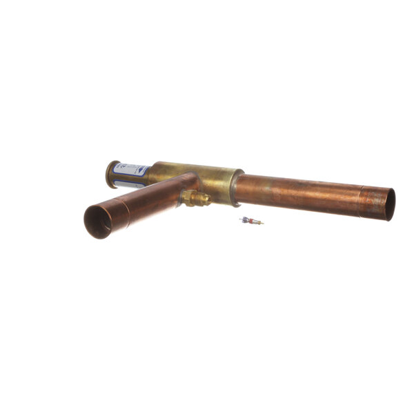A copper pipe with a brass valve connector.