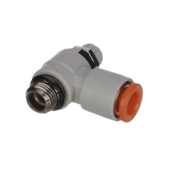 An orange and grey plastic Edlund valve with white and orange pipe fittings.