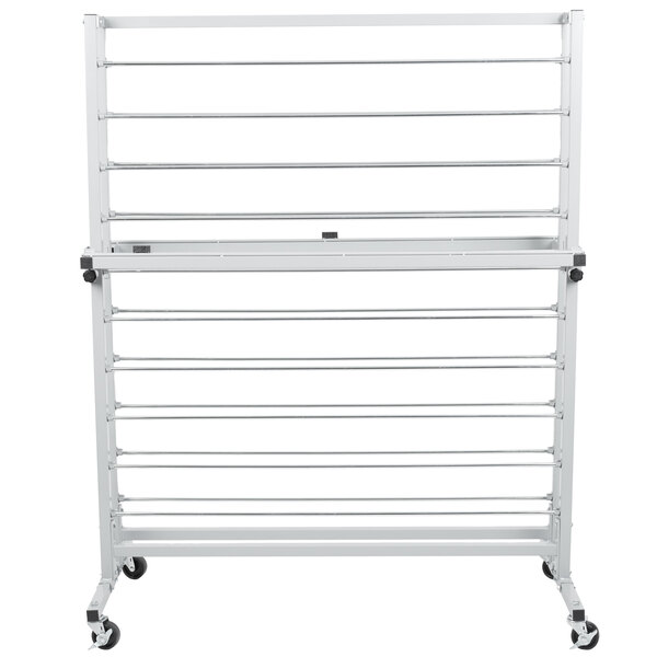 A white metal Bulman horizontal paper rack with wheels.
