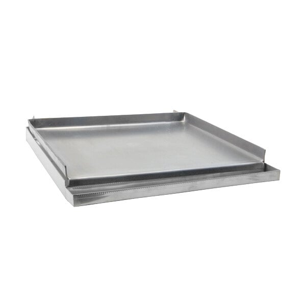 A stainless steel griddle top with a lid.