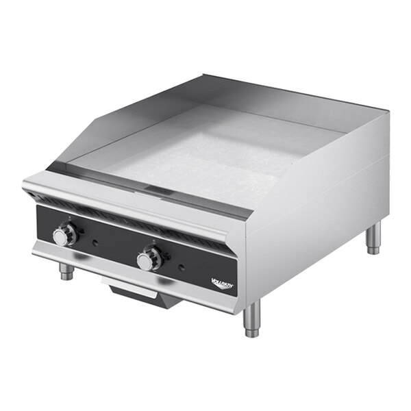 A silver and black Vollrath heavy duty countertop griddle with manual controls.