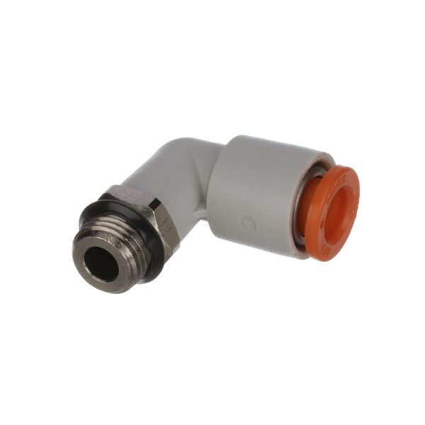 An orange and white plastic pipe fitting for an Edlund can opener.