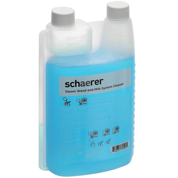 A plastic container of blue Schaerer steam wand cleaner.