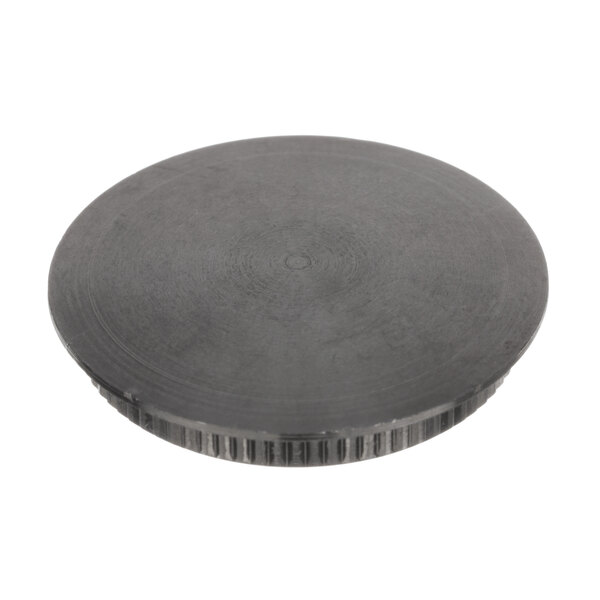 A black circular Vollrath slide cap with a hole in the center.