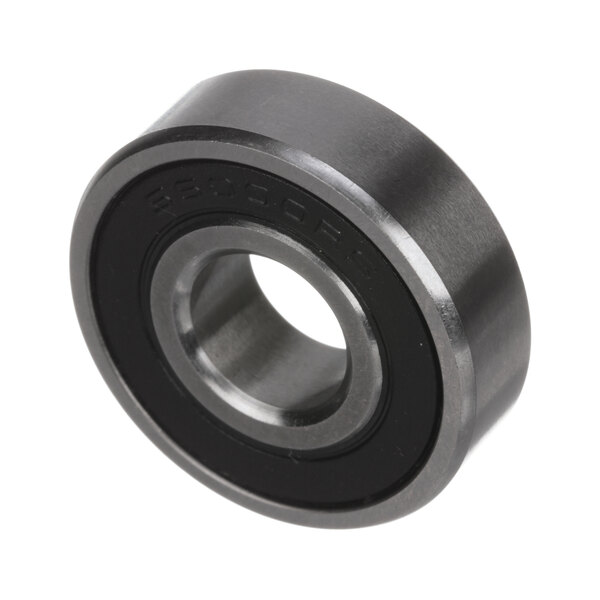 A Vollrath stainless steel meat slicer bearing with a black rubber seal.