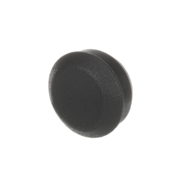 A close-up of a black plastic plug with a white background.