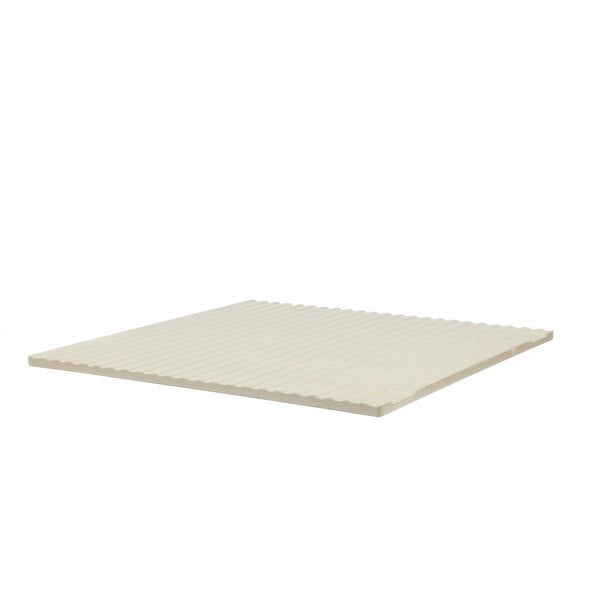 A white rectangular Waring Pizza Stone with a grid pattern.