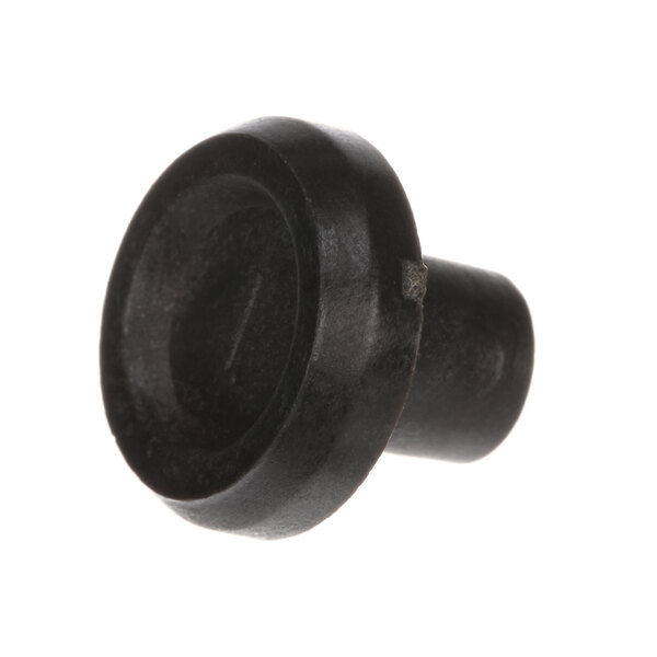 A black round Hobart anti-rotation plug with a hole in the center on a white background.
