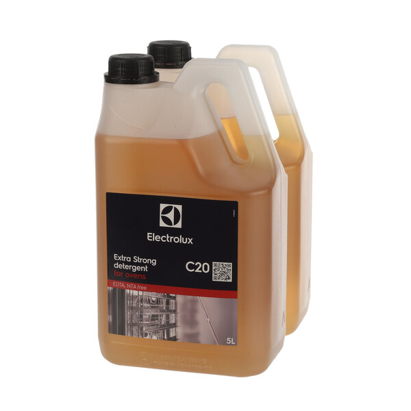 An Electrolux plastic jug filled with brown extra strong cleaning fluid.