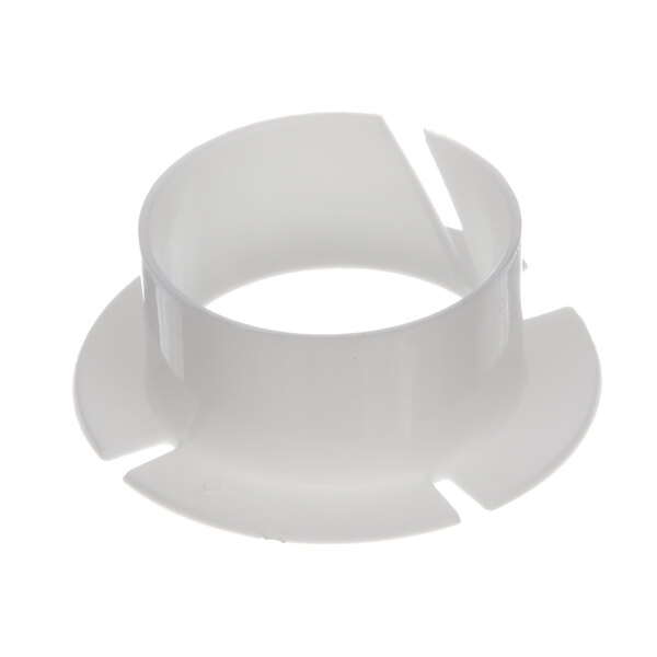 A white plastic ring with a hole in it.