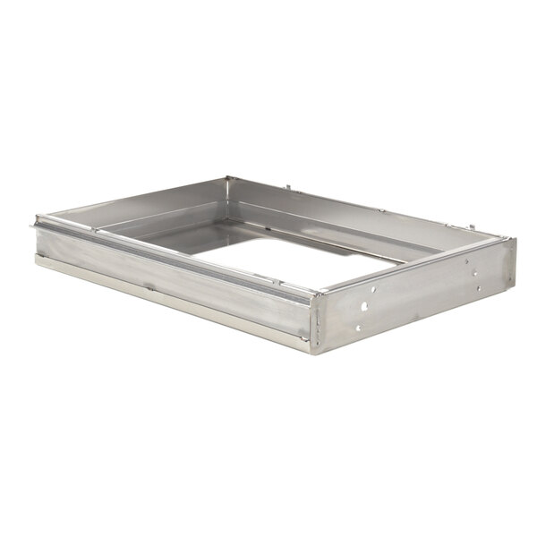 A white metal tray in a metal box with a hole in the middle.