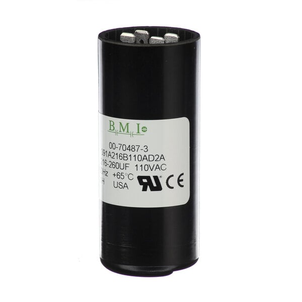 A black cylindrical Hobart capacitor with white label reading "P M L".