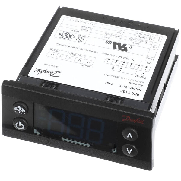A black Delfield digital temperature controller with a white label.