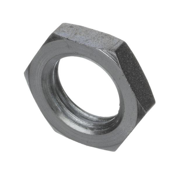 A close-up of a black metal nut with a hexagon shape.