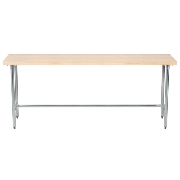An Advance Tabco wood work table with metal legs.
