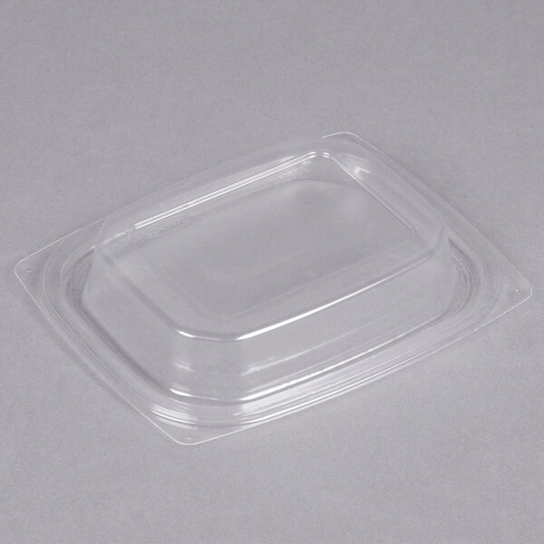 A Dart clear plastic container with a clear snap-on dome lid.
