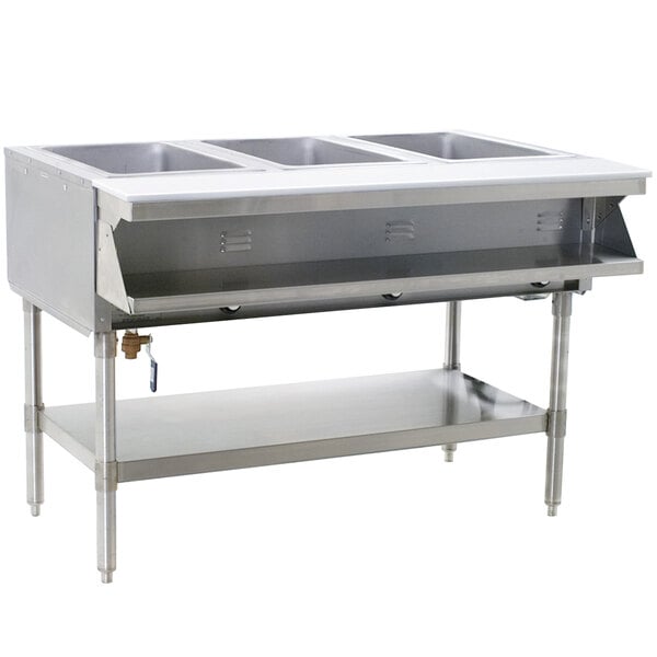 A stainless steel Eagle Group SHT3 steam table on a counter with three trays.
