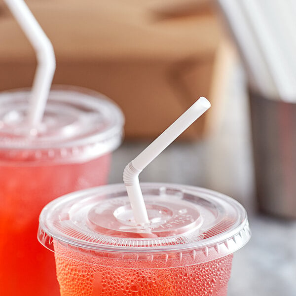 Two plastic cups with Choice white flex straws.