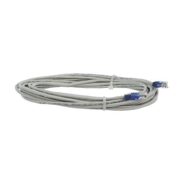 A white Lancer signalisation cable with blue connectors.