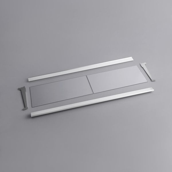 A white rectangular metal frame with two strips and a handle.