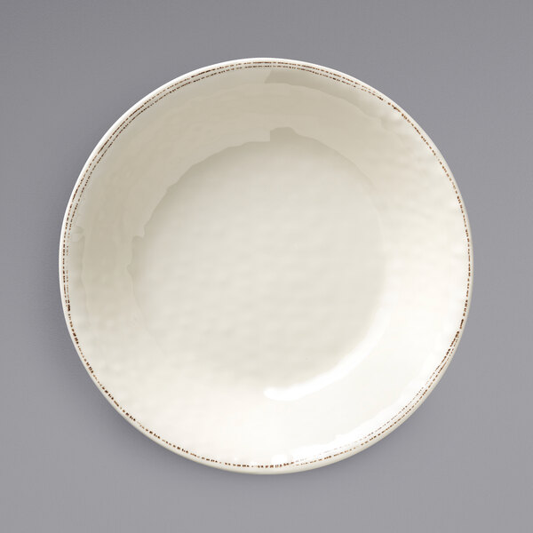 A white Libbey Farmhouse melamine bowl with an organic rim.