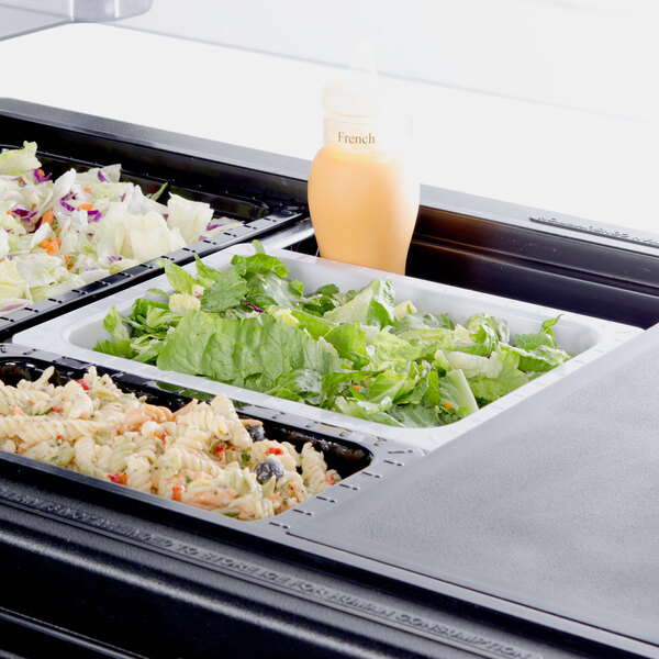 A white GET melamine food pan filled with salad on a salad bar counter.